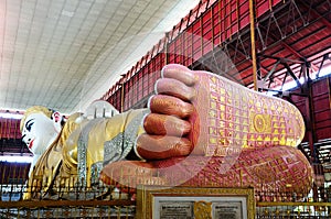 Chauk Htat Gyi Reclining Buddha Image at Kyauk Htat Gyi Pagoda in Yangon, Burma. photo